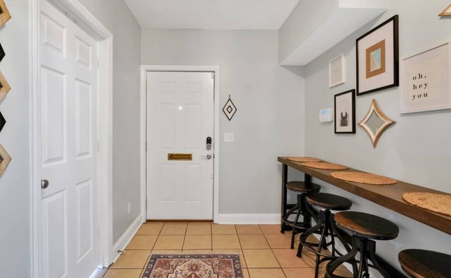 Building Photo - UNFURNISHED - 2 Bed 2 Bath + HUGE BONUS in a wooded oasis - NO HOA - off Middle Sound Loop
