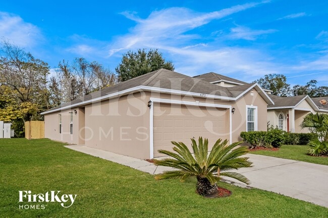 Building Photo - 6671 Gentle Oaks Dr N