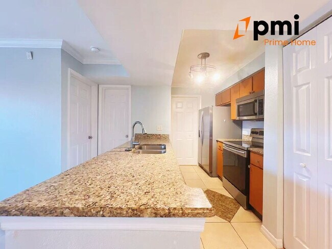 Building Photo - "Charming 2-Bed, 2-Bath Condo Oasis in Kis...