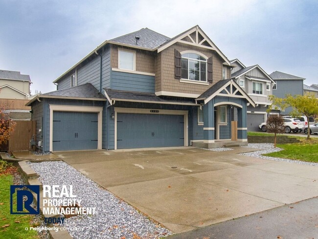 Building Photo - Spacious Modern 5-Bedroom Home with 3-Car ...