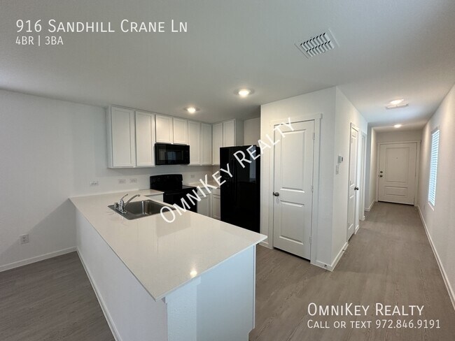 Foto del edificio - 916 Sandhill Crane Ln