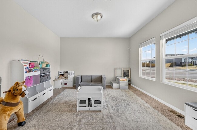 Building Photo - Upgraded 4-Bedroom Corner Lot Home with Mountain Views