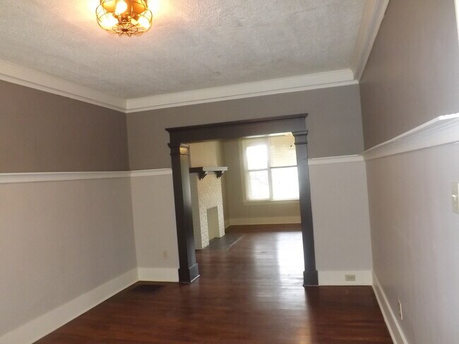 Dining room looking into living room - 325 N Murtland St