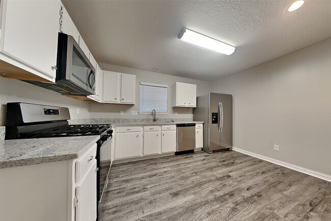 Foto del edificio - 18623 Singing Woods Dr