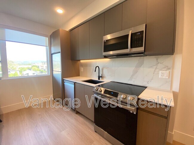 Photo du bâtiment - 406-720 KLO Rd