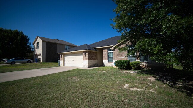 Building Photo - Beautiful 4-Bedroom Home with Spacious Bac...