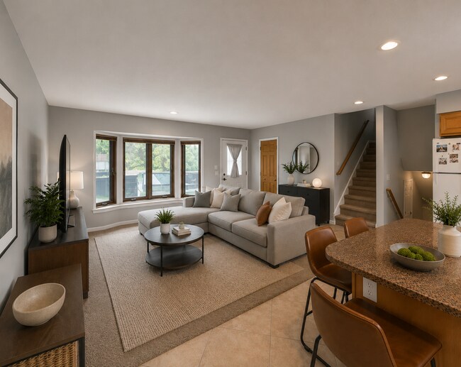Planta principal: entrada, sala de estar y cocina. - 10700 11th Ave N