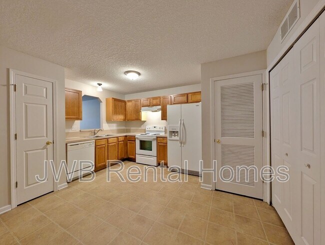 Foto del edificio - 8402 McGirts Village Ln