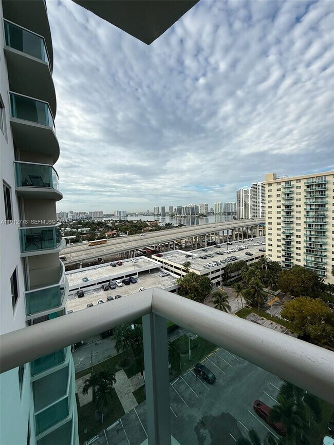 Building Photo - 19380 Collins Ave