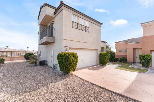 Building Photo - Charming three-bedroom, two-bath home located in a gated community in Summerlin!