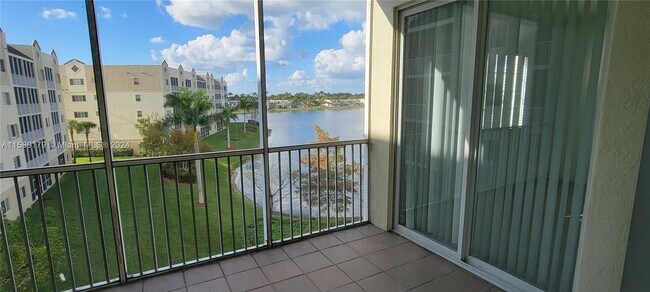 Building Photo - 10710 Northwest 66th Street Apt #409, Dora...