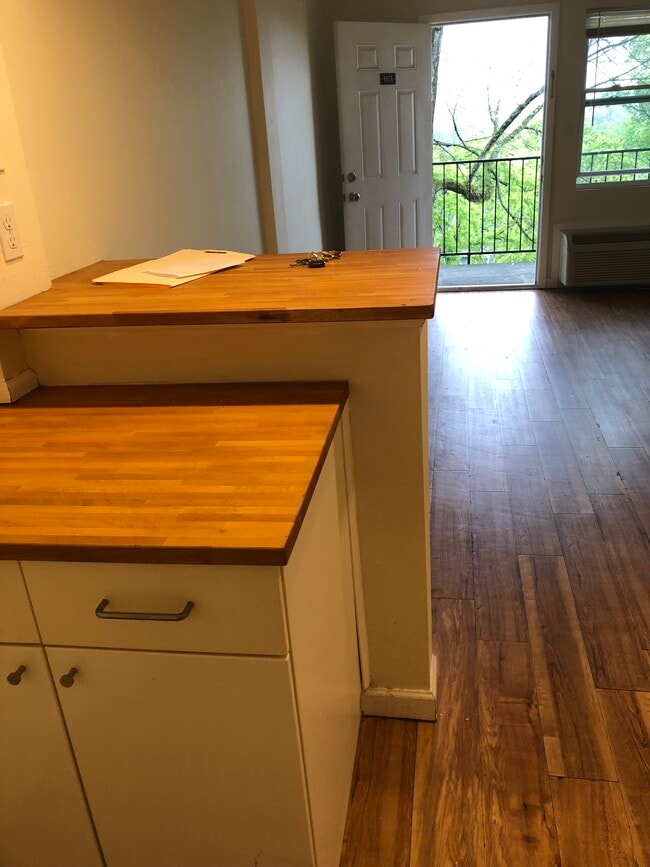 Studio toward Door - University Ridge Apartments