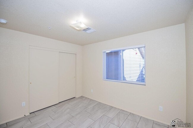 Building Photo - 7277 E 38th Ln