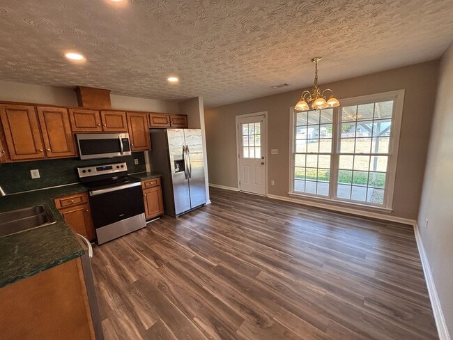 Building Photo - Keys to Happiness – Unlock Your New Home.