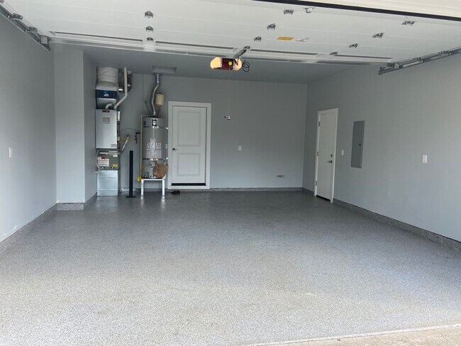 Coated garage floor. Room for car, tools and toys - 1016 NW 56th Way