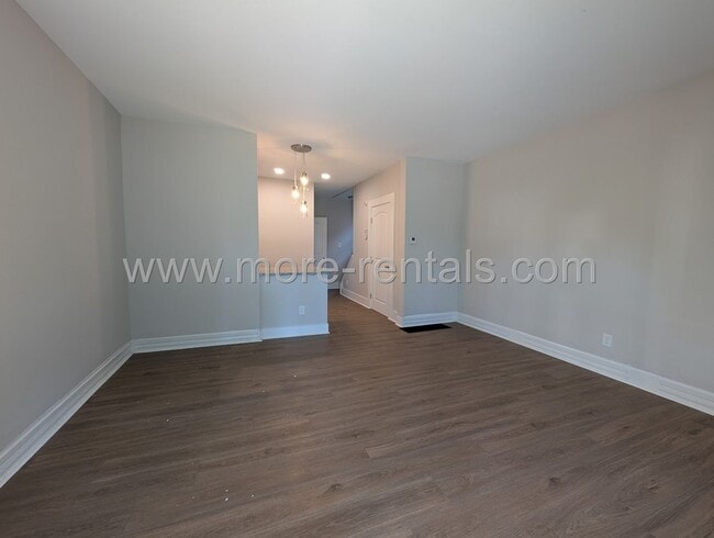 Building Photo - Remodeled house with fenced yard and garage