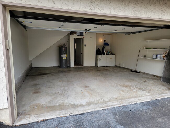 Attached 2 car garage. washer and dryer replaced since photo taken - 5440 Baltimore Dr