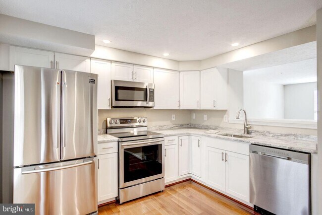 Building Photo - 6038 Weekend Way