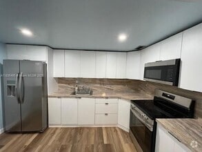 Building Photo - 1475 NE 125th Terrace