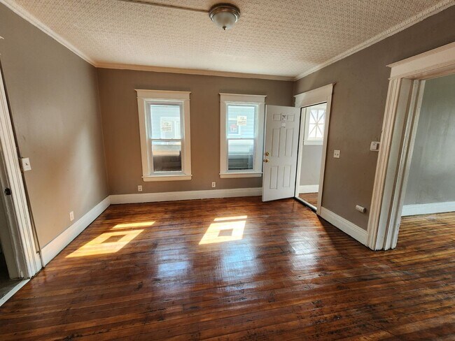Building Photo - Four Bedroom, Two Full Bath Single Family ...