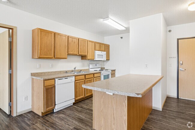 4 habitaciones, 3 baños - 1470 pies cuadrados - Cocina - Dakota Crossing Apartments