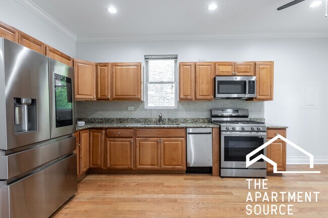 Foto del edificio - 3703 W Belmont Ave
