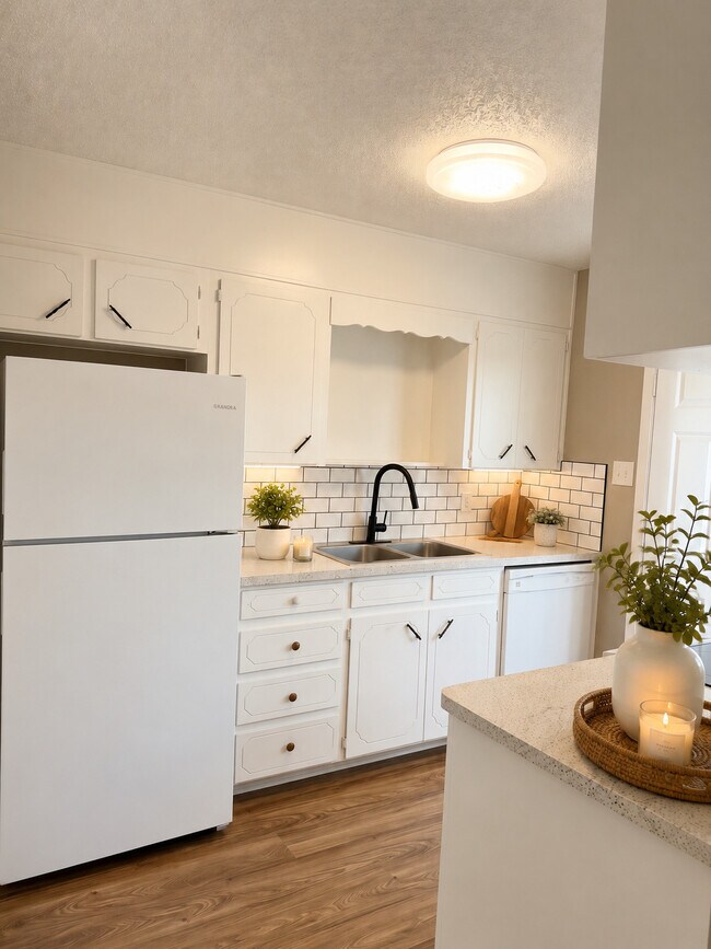 Foto del edificio - The Hunnington Townhomes