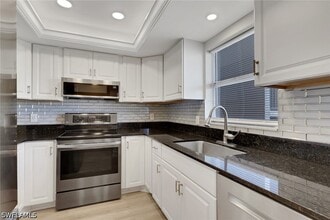 Building Photo - 4912 Tamiami Trl E