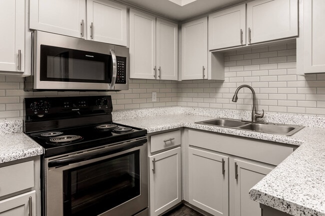 Kitchen with Subway Tile Backsplash and Modern Sink with Spray Faucet - Diamond Interior - The Morrison