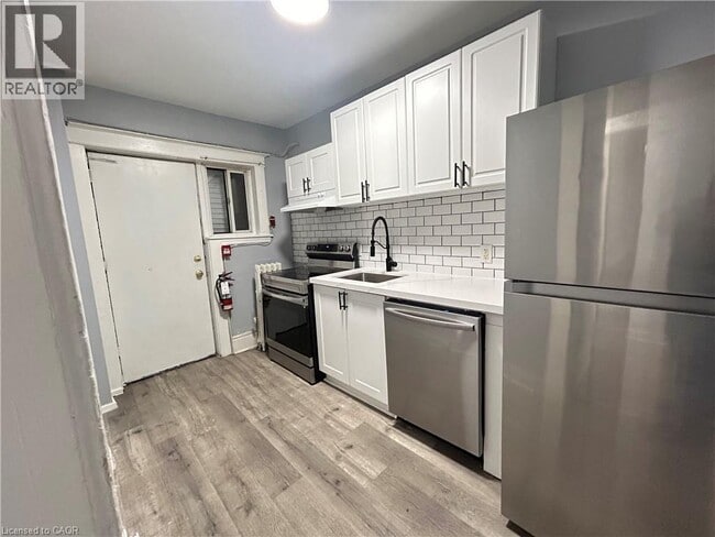 Building Photo - 831 Main St E