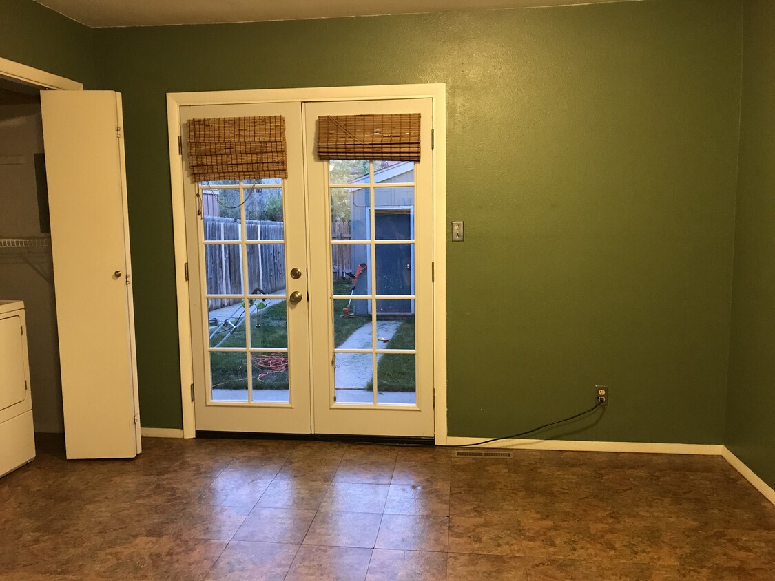 view from kitchen showing backyard through patio doors - 1360 N 18th St