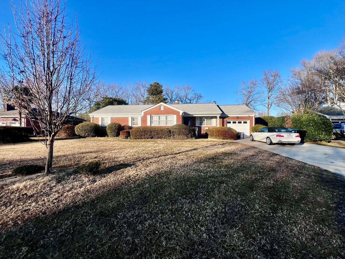 Primary Photo - Lovely mid-sentry brick ranch on a beautif...