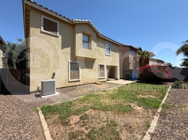 Building Photo - 6333 W Valencia Dr