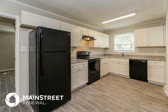 Foto del edificio - 3313 Woodlea Dr