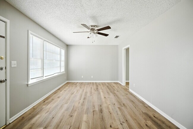 Building Photo - Fresh Paint, New Floors, and a Fresh Start!