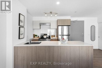 Building Photo - 100-100 Manett Crescent
