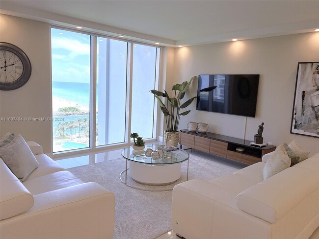 Building Photo - 10275 Collins Ave