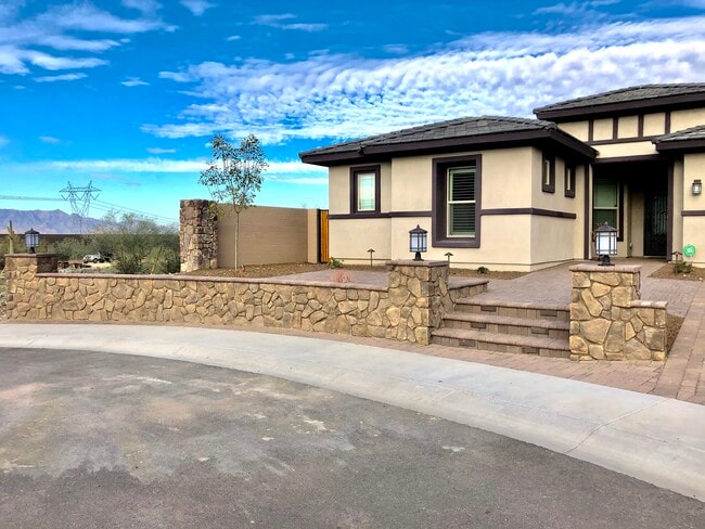 Deorative stone steps leads to entry - 3550 W Wildwood Dr