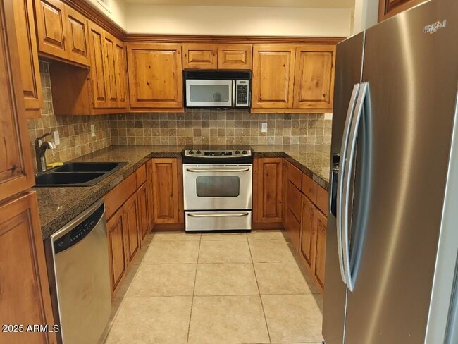 Building Photo - 8428 E Malcomb Dr