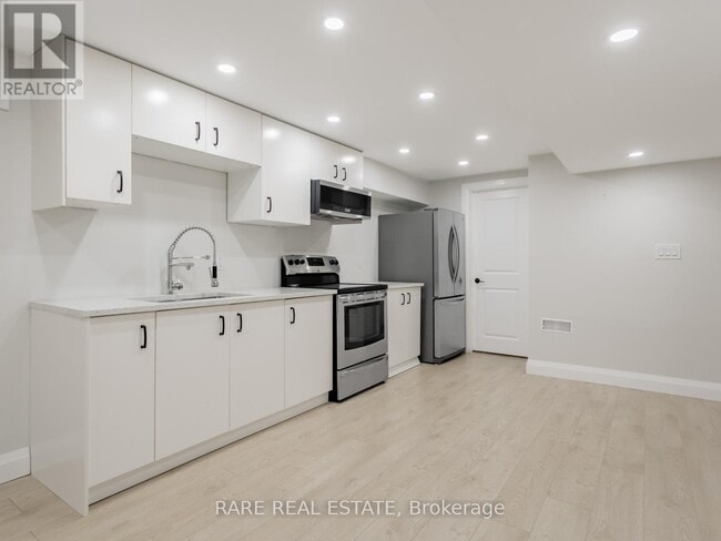 Building Photo - 3551 Wass Crescent