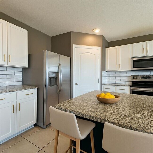 Foto del edificio - 5642 Westerly Breeze Pl