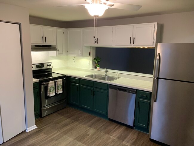 Modern updated kitchen with stainless appliances - 7747 Kelley Ct