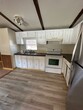 Primary Photo - 3 Bedrooms, 1 Bathroom Trailer Home in Mot...
