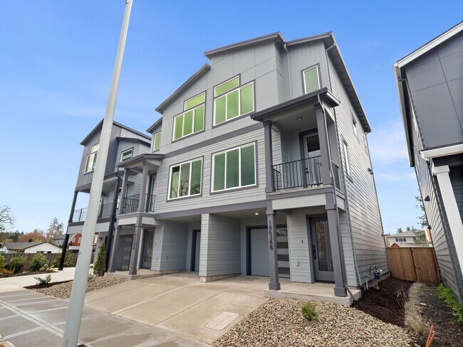 Building Photo - $500 move-in special! New, new, new! Gorgeous 2-bdrm/2.5-bath duplex townhome w/ garage, W/D, in ...