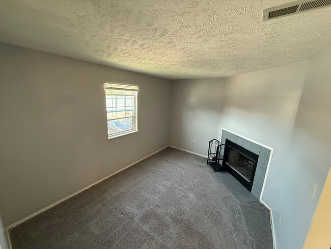 library with log burning fireplace - 1150 Tollios Parkway
