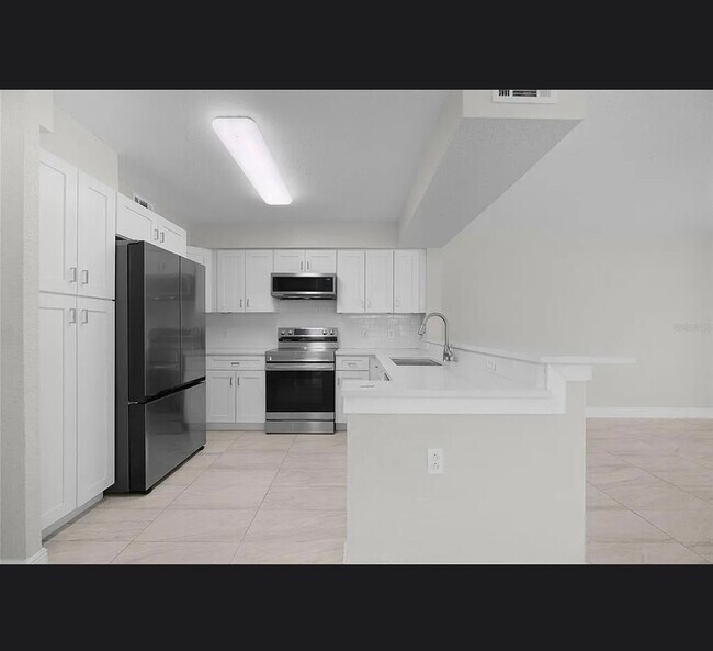 Foto del edificio - 13929 Fairway Island Dr
