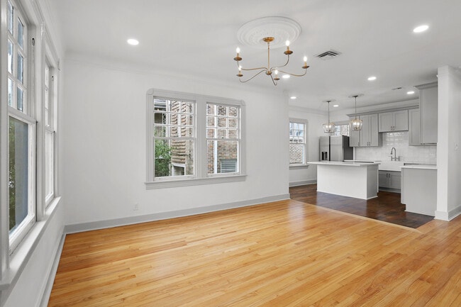 Combination living and kitchen - 3801 Nashville Ave Apartments