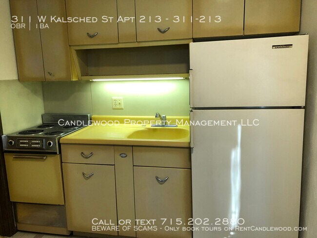 Building Photo - Studio Upper Apartment Available Now!