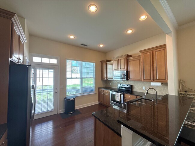Building Photo - End unit in Waters Edge Community in Belmont!