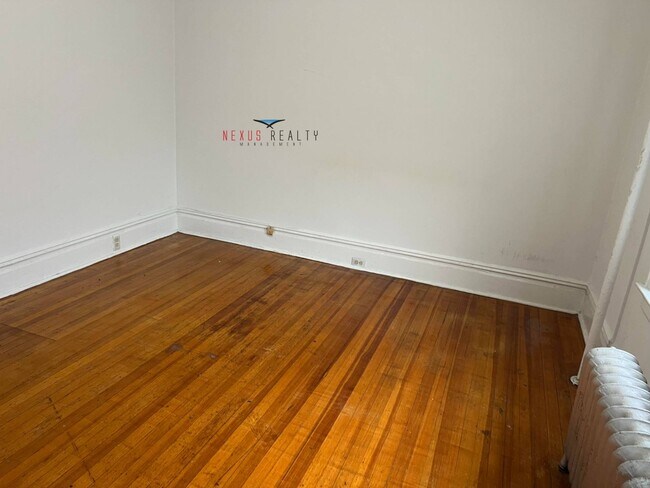 Building Photo - 25-66-66 42nd St